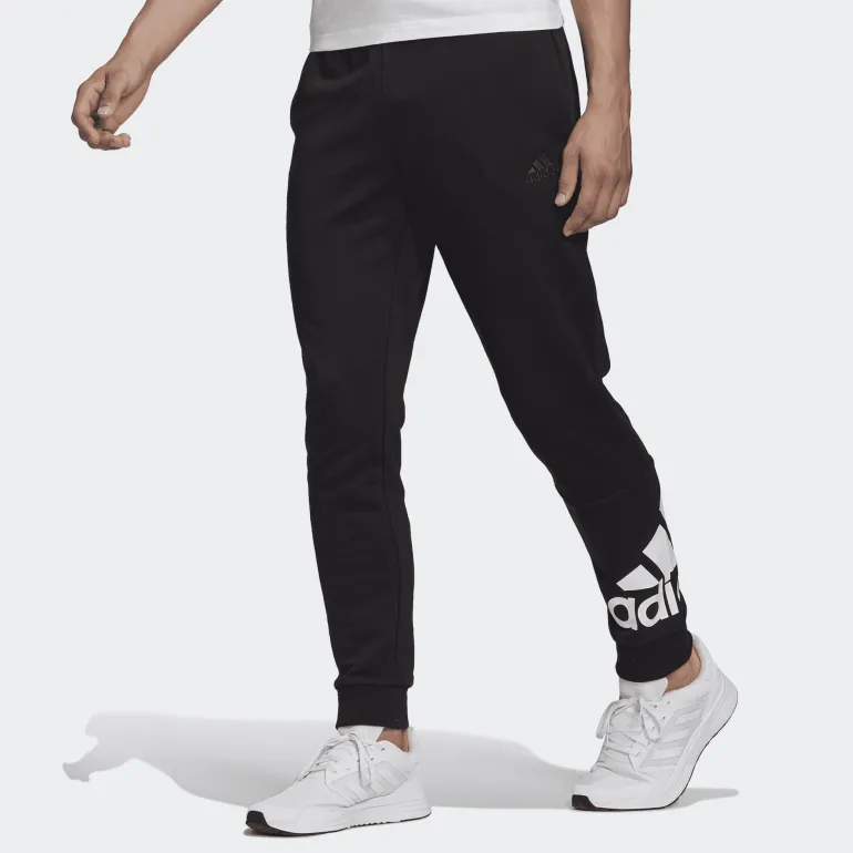 PANTALONI SPORTIVI DA UOMO ADIDAS ESSENTIALS IN FRENCH TERRY NERI CON POLSINO