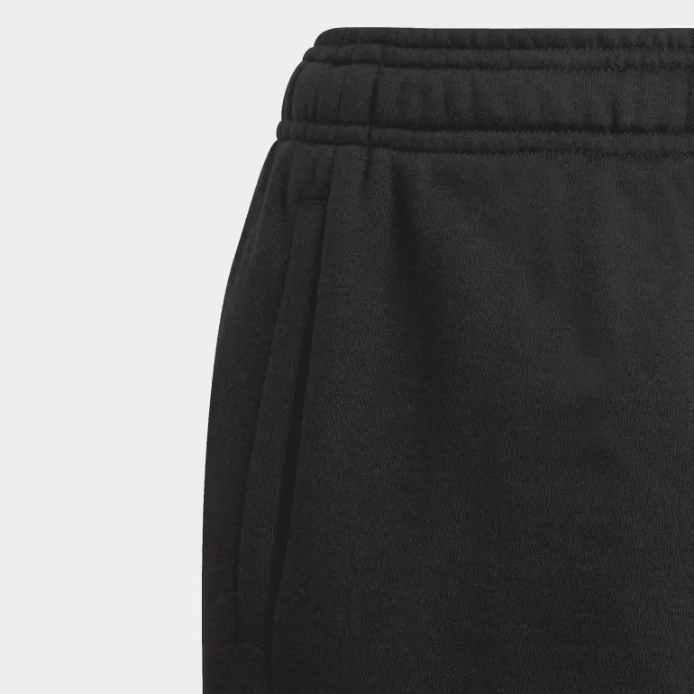 PANTALONI SPORTIVI JUNIOR ADIDAS ESSENTIALS IN FRENCH TERRY NERI CON SCRITTA LATERALE